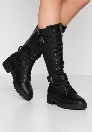 كتيب توزيع له botas negras zalando - tropicanaetrade.com