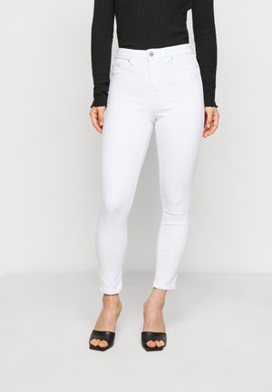 miss selfridge coated jeans