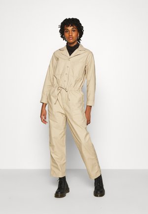 Beige Jumpsuit til damer finner du på nett hos Zalando Monki KALOLO - Jumpsuit - beige